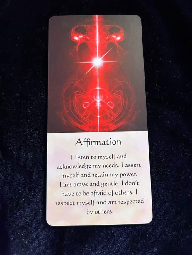Positive affirmation card with red energy pattern, promoting self-empowerment and confidence.