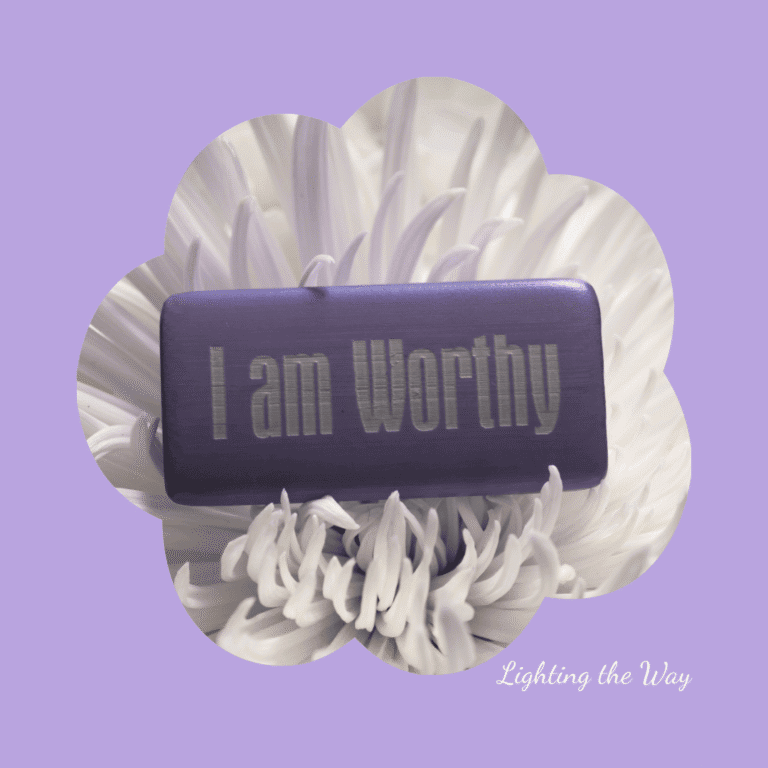 Worthy motivational message on an inside purple box, placed on a white chrysanthemum flower, with Lavender background.